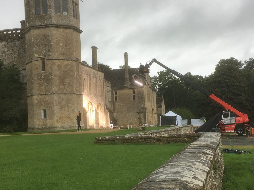 Manitou used for lifting green screen on film set